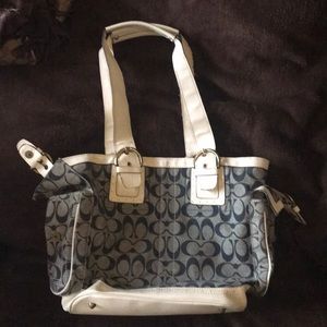 Blue and white loved coach purse.